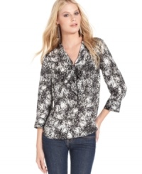 A bow tie adds a retro appeal to this Kensie printed blouse -- perfect for an on-trend office look! A bow tie adds a retro appeal to this Kensie printed blouse -- perfect for an on-trend office look!