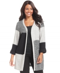Cozy up to the chic comfort of Debbie Morgan's colorblocked plus size cardigan-- it's a staple for the season! Cozy up to the chic comfort of Debbie Morgan's colorblocked plus size cardigan-- it's a staple for the season!