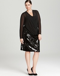 Update your LBD portfolio with this DKNYC Plus dress, comprised of a sheer draped bodice and sleek sequin skirt for pure modern edge. Amp up the shine factor with silver accents.