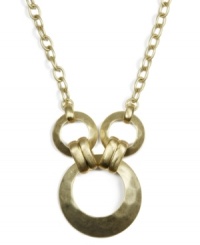 Industrial chic meets rustic charm in this unique triple ring pendant from Jones New York. Hammered texture necklace crafted from gold-plated mixed metal. Approximate length: 18 inches. Approximate drop: 2 inches.