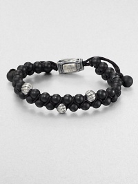 From the Spirited Bead Collection, this two-row beaded bracelet is handsomely crafted from 6mm black onyx beads, featuring three sterling silver cable beads and an adjustable clasp.Sterling silverBlack onyxAbout 9 longAbout 3 diam.Imported From the Spirited Bead Collection, this two-row beaded bracelet is handsomely crafted from 6mm black onyx beads, featuring three sterling silver cable beads and an adjustable clasp.Sterling silverBlack onyxAbout 9 longAbout 3 diam.Imported