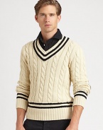 Fashioned in a heritage cable knit from luxe Italian cotton, a classic V-neck sweater is adorned with cricket stripes and herringbone wool elbow patches for authentic style.V-neckRibbed collar, cuffs and hemElbow patch detailCottonHand washImported