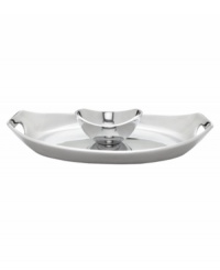 At once graceful and modern, this aluminum chip and dip reflects great taste at every meal. A radiant oval tray with sloping sides and handle cutouts holds an equally chic bowl for serving guacamole, salsa, or spinach dip. From Dansk's collection of serveware and serving dishes. At once graceful and modern, this aluminum chip and dip reflects great taste at every meal. A radiant oval tray with sloping sides and handle cutouts holds an equally chic bowl for serving guacamole, salsa, or spinach dip. From Dansk's collection of serveware and serving dishes.
