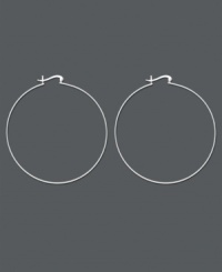 Add a dramatic touch with large hoop earrings by Unwritten. Perfect for night or day wear, these classic hoops feature a click top backing crafted in smooth sterling silver. Approximate diameter: 2-1/2 inches.