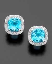 Light up the room with beautiful cushion-cut blue topaz earrings(2-3/4 ct. t.w.) surrounded by sparkling round-cut diamonds (1/4 ct. t.w.) set in 14k white gold. Light up the room with beautiful cushion-cut blue topaz earrings(2-3/4 ct. t.w.) surrounded by sparkling round-cut diamonds (1/4 ct. t.w.) set in 14k white gold.