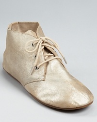 In the softest metallic leather, these laid-back booties from House of Harlow 1960 lend bohemian style to off-duty afternoons. In the softest metallic leather, these laid-back booties from House of Harlow 1960 lend bohemian style to off-duty afternoons.