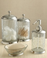 Moisturize in in the sleekly mod style of the Crackle Glass soap and lotion dispenser. Crackle glass creates a refined texture and look while brass-based metal with a shiny nickel finish creates clean lines. Moisturize in in the sleekly mod style of the Crackle Glass soap and lotion dispenser. Crackle glass creates a refined texture and look while brass-based metal with a shiny nickel finish creates clean lines.