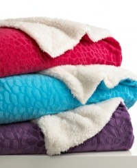 Comfort zone. Lounge around with the soft texture and chic style of these throws from Teen Vogue, featuring an embossed crocodile pattern and a variety of bright colors. Reverses to sherpa. Coordinate with the matching pillows. Comfort zone. Lounge around with the soft texture and chic style of these throws from Teen Vogue, featuring an embossed crocodile pattern and a variety of bright colors. Reverses to sherpa. Coordinate with the matching pillows.