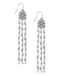 It's all in the name - the High Society earrings from Lauren by Ralph Lauren exude a look of sophistication. Each earring features glass pearl tassel drops (3 mm) and a glass-accented basket weave charm. Setting and fishwire backing crafted in silver tone mixed metal. Approximate drop: 3 inches. Approximate diameter: 1/2 inch. It's all in the name - the High Society earrings from Lauren by Ralph Lauren exude a look of sophistication. Each earring features glass pearl tassel drops (3 mm) and a glass-accented basket weave charm. Setting and fishwire backing crafted in silver tone mixed metal. Approximate drop: 3 inches. Approximate diameter: 1/2 inch.