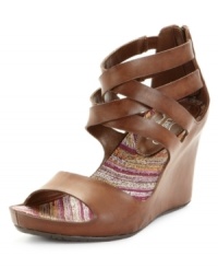 Oh, the tangled fashion webs we weave! Get into trouble with the strappy upper and zippered back of the Web Maker wedge sandals by Unlisted. Oh, the tangled fashion webs we weave! Get into trouble with the strappy upper and zippered back of the Web Maker wedge sandals by Unlisted.