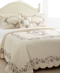 Sleeping beauty. Delicately embroidered blossoms and meandering vines embellish cloud-like quilting for a look of enchantment. Finished with scalloped edges. Sleeping beauty. Delicately embroidered blossoms and meandering vines embellish cloud-like quilting for a look of enchantment. Finished with scalloped edges.