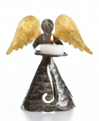 It takes two days to create – one to hammer and shape the steel, plus another to apply the foil and finish – but this beautiful angel candle holder will radiate joy for years to come. Handmade out of empty oil drums, each is a testament to the Croix-des-Bouquets artisans' ingenuity. It takes two days to create – one to hammer and shape the steel, plus another to apply the foil and finish – but this beautiful angel candle holder will radiate joy for years to come. Handmade out of empty oil drums, each is a testament to the Croix-des-Bouquets artisans' ingenuity.
