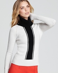 An exceptionally soft layer for the cooler months to come, this chic Theory sweater brings the two most celebrated neutrals together for an eye-catching look that beckons a pop of color below. An exceptionally soft layer for the cooler months to come, this chic Theory sweater brings the two most celebrated neutrals together for an eye-catching look that beckons a pop of color below.