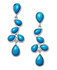 A waterfall effect. Pear-cut drops of turquoise (3-8 mm) create quite the splash in a sterling silver setting. Approximate drop: 1-3/4 inches. A waterfall effect. Pear-cut drops of turquoise (3-8 mm) create quite the splash in a sterling silver setting. Approximate drop: 1-3/4 inches.