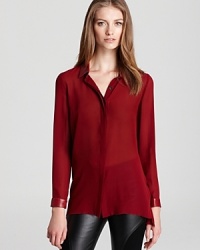 A Sachin + Babi button-down shirt gets a luxe lift from a leather collar, while a raw-edge, high/low hem puts a modern spin on the classic style. A Sachin + Babi button-down shirt gets a luxe lift from a leather collar, while a raw-edge, high/low hem puts a modern spin on the classic style.