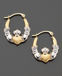 A traditional symbol of love and friendship, these beautiful claddagh hoop earrings are crafted in white & yellow 14k gold. Approximate diameter: 1/2 inch. A traditional symbol of love and friendship, these beautiful claddagh hoop earrings are crafted in white & yellow 14k gold. Approximate diameter: 1/2 inch.