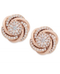 Swirls of sparkle adorn these symbolic knot earrings by Wrapped in Love™. Crafted in 14k rose gold with an array of pave-set round-cut diamonds (3/4 ct. t.w.). Approximate diameter: 1/4 inch. Swirls of sparkle adorn these symbolic knot earrings by Wrapped in Love™. Crafted in 14k rose gold with an array of pave-set round-cut diamonds (3/4 ct. t.w.). Approximate diameter: 1/4 inch.