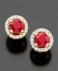 Sweet round-cut rubies (5/8 ct. t.w.) are simply stunning on these beautiful stud earrings. Set in 14k gold and highlighted with round-cut diamonds (1/10 ct. t.w.). Sweet round-cut rubies (5/8 ct. t.w.) are simply stunning on these beautiful stud earrings. Set in 14k gold and highlighted with round-cut diamonds (1/10 ct. t.w.).