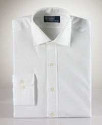 For a tailored, professional look, go for this handsome button down shirt, featuring a tailored fit with a contoured torso, narrow armholes and barrel cuffs. Crafted from fine cotton using single-needle stitching. Regent collar, button cuff and round hem. Embroidered logo at left chest.