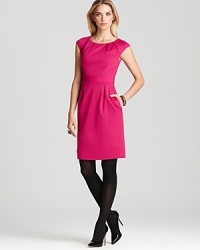 Elegantly structured in soft ponte with a touch of stretch, our newest Trina Turk dress flaunts a flattering banded waist and classic pleating along the neckline. Elegantly structured in soft ponte with a touch of stretch, our newest Trina Turk dress flaunts a flattering banded waist and classic pleating along the neckline.