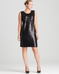 Dripping with decadent sequins, this Calvin Klein Plus dress lends liquid-like dimension to your cocktail look. Amp up the shine factor with sleek silver accents. Dripping with decadent sequins, this Calvin Klein Plus dress lends liquid-like dimension to your cocktail look. Amp up the shine factor with sleek silver accents.