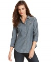 Whether worn loose and layered or all buttoned up, this chambray shirt from Calvin Klein Jeans is a staple you'll love season after season. Try it with dark denim for a chic monochromatic look!
