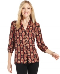 A beautiful tribal-inspired print makes this petite Jones New York Signature a real stunner! Wear it with slim trousers or jeans for a versatile look. A beautiful tribal-inspired print makes this petite Jones New York Signature a real stunner! Wear it with slim trousers or jeans for a versatile look.