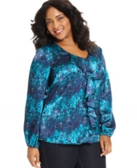 A ruffled front beautifully finishes Jones New York Signature's printed plus size top-- dress it up with trousers or down with denim. A ruffled front beautifully finishes Jones New York Signature's printed plus size top-- dress it up with trousers or down with denim.