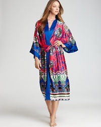 Expect bright hues and an all-over paisley print with this robe from Natori. Expect bright hues and an all-over paisley print with this robe from Natori.
