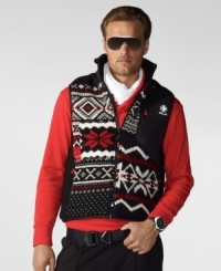 A cozy vest is rendered in a warm wool blend with eye-catching patchwork for stylish shelter from the cold. A cozy vest is rendered in a warm wool blend with eye-catching patchwork for stylish shelter from the cold.