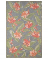 Blissfully exotic: The Tommy Bahama Hibiscus Bliss rug brings a lush, tropical feel to any indoor or outdoor space. Durable, fade-resistant fibers are hand-hooked to create a richly layered surface, making the rug a perfect accent in any high-traffic area. Hose off for easy cleaning. Blissfully exotic: The Tommy Bahama Hibiscus Bliss rug brings a lush, tropical feel to any indoor or outdoor space. Durable, fade-resistant fibers are hand-hooked to create a richly layered surface, making the rug a perfect accent in any high-traffic area. Hose off for easy cleaning.