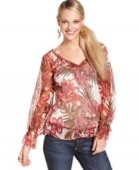 In a sheer chiffon, this floral-print Lucky Brand Jeans blouse adds feminine appeal to everyday denim! In a sheer chiffon, this floral-print Lucky Brand Jeans blouse adds feminine appeal to everyday denim!