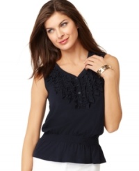 Perfectly pretty--Jones New York Signature petite top features a ruffled buttoned placket and is smocked at the low waist for a totally feminine silhouette. Pair with skinny white pants and shiny gold accessories for easy style. Perfectly pretty--Jones New York Signature petite top features a ruffled buttoned placket and is smocked at the low waist for a totally feminine silhouette. Pair with skinny white pants and shiny gold accessories for easy style.