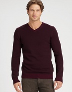 The perfect option for transitional weather, this versatile v-neck, shaped in a luxurious wool and cashmere blend, can be worn alone, or layered, as those cold weather days approach.V-neckRibbed collar, cuffs and hem70% wool/30% cashmereHand washImported