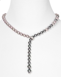 In a cool hue, Majorica's gray pearl strand is dark, stormy and seriously chic. Layer it over a little black dress as an alternative to classic whites. In a cool hue, Majorica's gray pearl strand is dark, stormy and seriously chic. Layer it over a little black dress as an alternative to classic whites.
