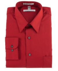 Maintain your crisp, professional look all day long in this handsome, wrinkle-free shirt. With a subtle sateen finish and tailored fit, it features a point collar, chest pocket, button cuff and French placket. Round hem. Maintain your crisp, professional look all day long in this handsome, wrinkle-free shirt. With a subtle sateen finish and tailored fit, it features a point collar, chest pocket, button cuff and French placket. Round hem.