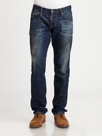 Whiskering and distressed details lend this denim style a cool, lived-in look.Belt loopsZip fly with button closureFive-pocket styleInseam, about 31CottonDry cleanMade in Italy of imported fabric Whiskering and distressed details lend this denim style a cool, lived-in look.Belt loopsZip fly with button closureFive-pocket styleInseam, about 31CottonDry cleanMade in Italy of imported fabric
