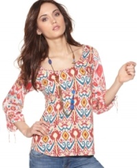 Channel a bohemian attitude in this breezy peasant top from Lucky Brand Jeans, featuring a colorful ikat-inspired print. It's a great match with jeans! Channel a bohemian attitude in this breezy peasant top from Lucky Brand Jeans, featuring a colorful ikat-inspired print. It's a great match with jeans!