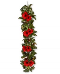 A careful arrangement of holly leaves, berries and pine branches evoke the timeless, natural beauty of winter foliage in this Holiday Garden garland from Winward. A careful arrangement of holly leaves, berries and pine branches evoke the timeless, natural beauty of winter foliage in this Holiday Garden garland from Winward.