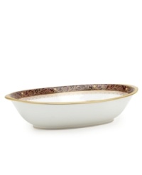 Add drama to your tabletop with this bold pattern from Noritake! Strikingly elegant, this bone china features a rich gold and red brocade border adorned with soft ivory dots and a gold band. Add drama to your tabletop with this bold pattern from Noritake! Strikingly elegant, this bone china features a rich gold and red brocade border adorned with soft ivory dots and a gold band.