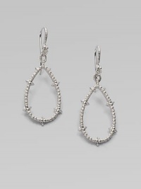 From the Calypso Collection. Spiky open teardrops with white sapphire accents hang from richly ribbed wires in this shining design.White sapphireRhodium platedLength, about 2Ear wireImported