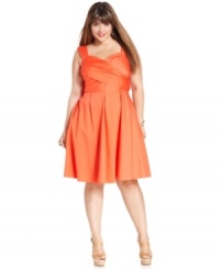 Look lean and lovely in Spense's sleeveless plus size dress, featuring a slenderizing crisscross front and A-line shape. Look lean and lovely in Spense's sleeveless plus size dress, featuring a slenderizing crisscross front and A-line shape.