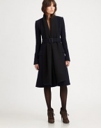 Guaranteed to turn heads, this wool coat features a waist-defining belt and flattering fit.Belted styleLong sleevesFlap pocketsBack ventFully linedAbout 40 from shoulder to hemWoolDry cleanMade in Italy of imported fabric Model shown is 5'9½ (176cm) wearing US size 4. 