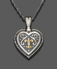Victorian elegance reigns in this 14k gold and sterling silver heart pendant. Approximate length: 24 inches. Approximate drop: 1-1/2 inches. Victorian elegance reigns in this 14k gold and sterling silver heart pendant. Approximate length: 24 inches. Approximate drop: 1-1/2 inches.