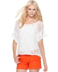 This open-knit sweater is a summery essential from Calvin Klein Jeans. Pair it with a tank top and bright shorts for an ensemble you'll love all season! This open-knit sweater is a summery essential from Calvin Klein Jeans. Pair it with a tank top and bright shorts for an ensemble you'll love all season!