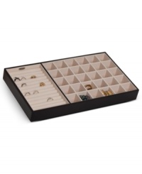 Bury treasure in a drawer with the Blaine jewelry organizer from Mele & Co. A large ring roll and divided sections for chains, pendants, bracelets and more keep every piece in pristine condition. With handsome faux leather exterior. Bury treasure in a drawer with the Blaine jewelry organizer from Mele & Co. A large ring roll and divided sections for chains, pendants, bracelets and more keep every piece in pristine condition. With handsome faux leather exterior.