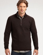 Best worn layered, this handsome, quarter-zip pullover design instantly adds a touch of sophistication to your ensemble.MockneckQuarter-zip placketRibbed knit collar, cuffs and hem60% rayon/25% nylon/15% woolDry cleanImported