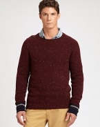 Whether worn layered or alone, this cozy crewneck sweater is the perfect addition to your collection of winter essentials.CrewneckRibbed knit collar, cuffs and hemLambswool/cotton/nylonDry cleanImported