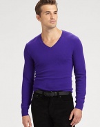 Luxuriously jersey-knit from soft cashmere yarns, a handsome sweater epitomizes modern polish in a trim, streamlined silhouette.V-neckRibbed knit collar, cuffs and hemCashmereDry cleanImported