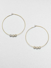 From the Brilliance Collection. A slender wire hoop, adorned with three sparkling beads, creates a look of understated glamour.GlassGoldtoneDiameter, about 1.25PiercedImported